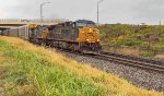 CSX 444 leads M276 through the rain.